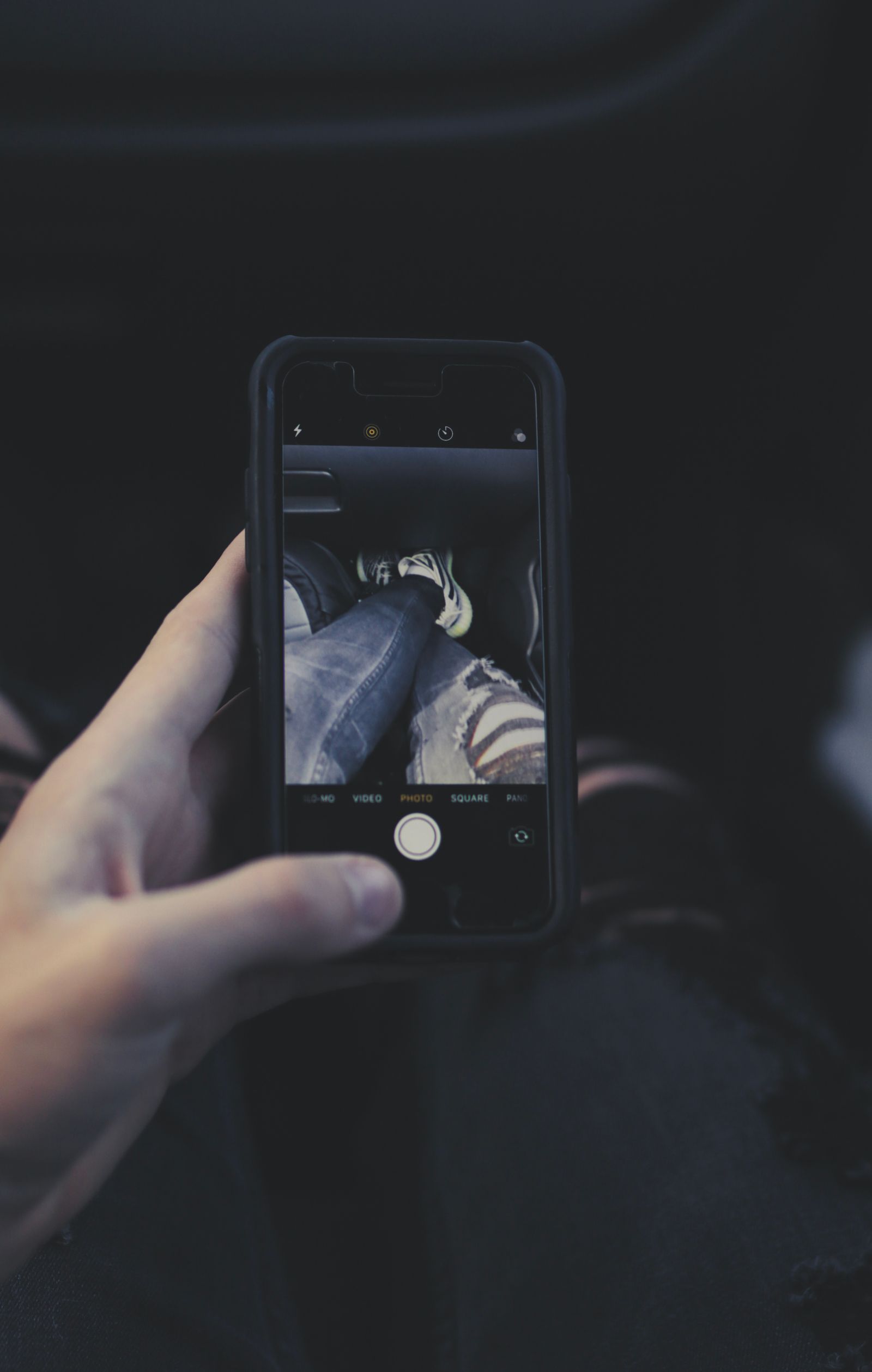 Person taking a photo with a smartphone