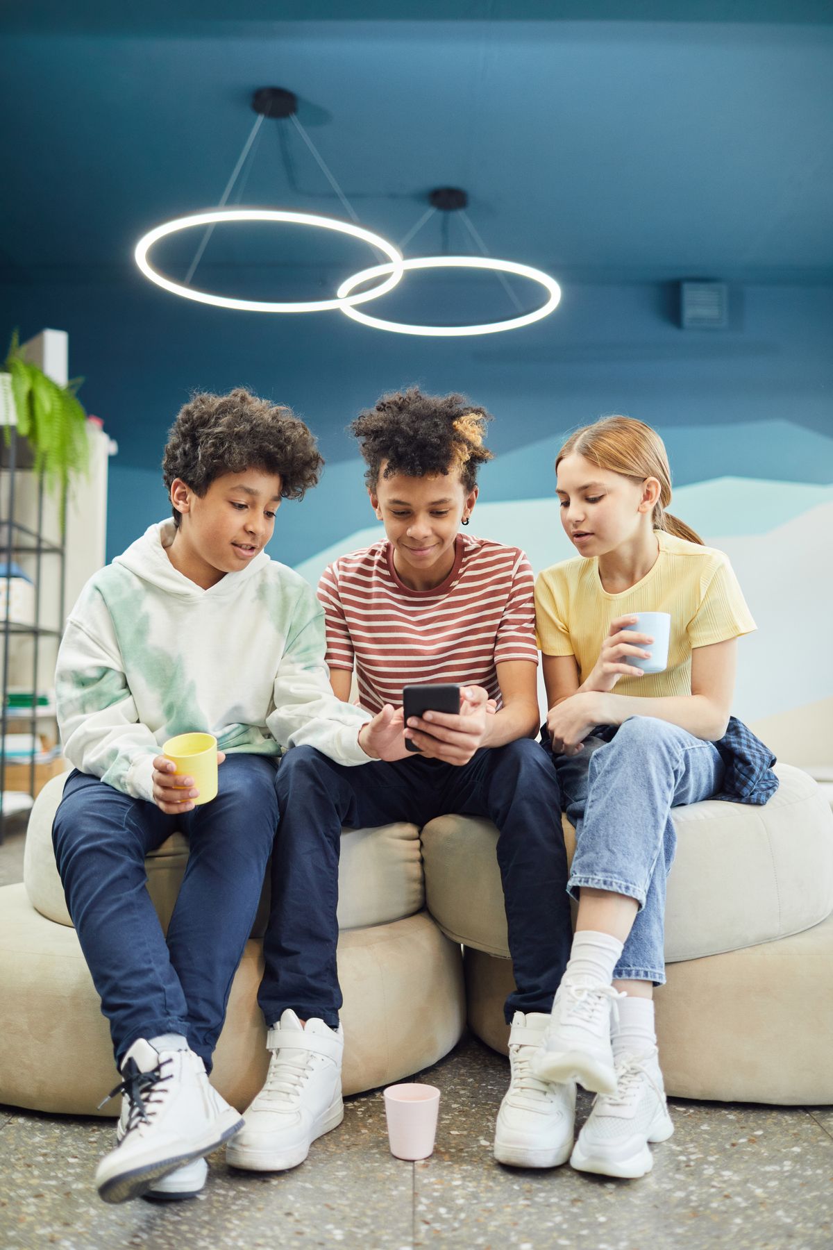 Friends using smartphones together